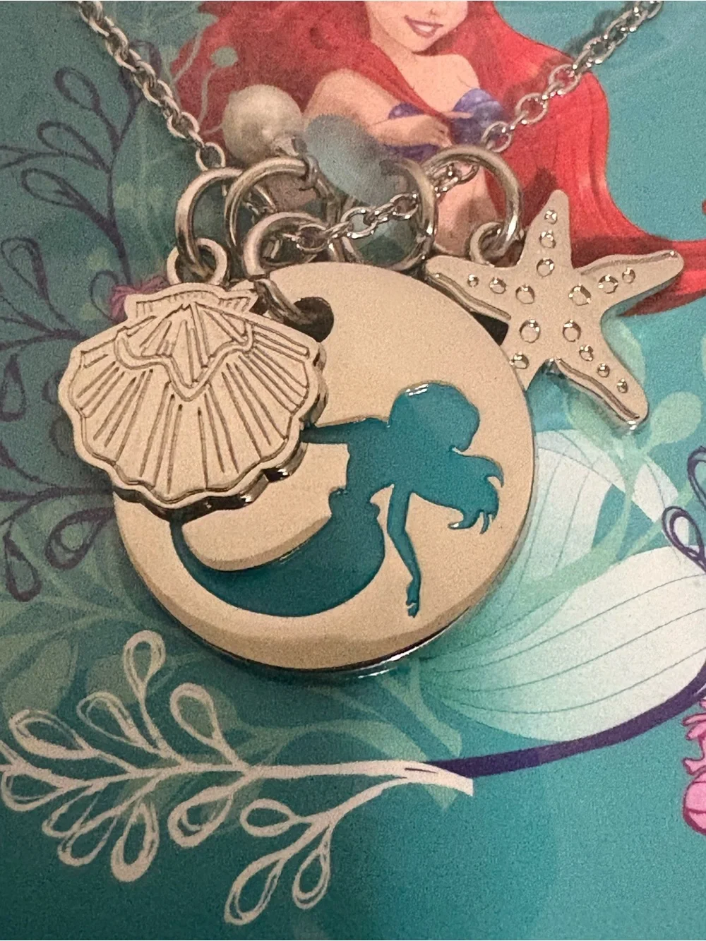 Disney The Little Mermaid Charm Necklace Sea shell star fish silver tone. New.